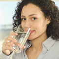 women drinking ionized water